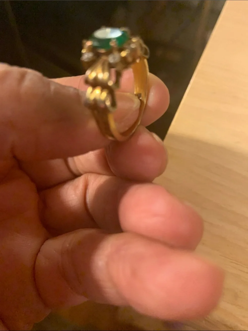 Elegant Gold-Tone Ring with Green Stone